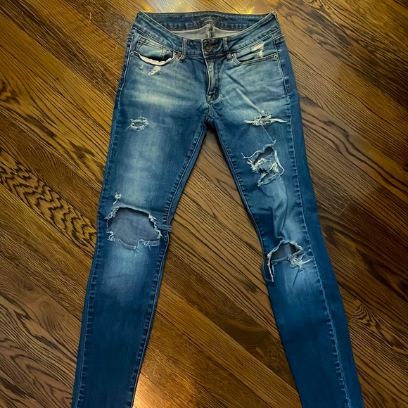 Distressed Skinnys - Picture 1 of 4